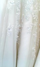 embellished tulle fabric in ivory